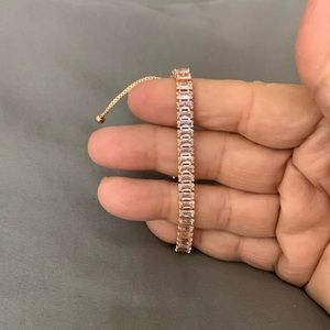 Gold with clear rinestones.